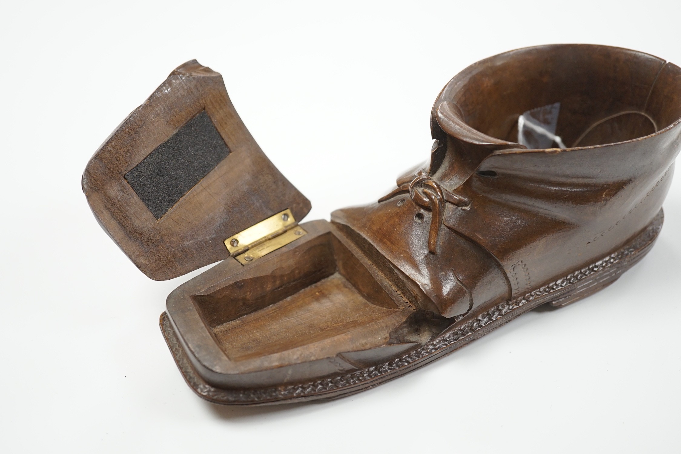 A Swiss Caux treen 'boot' vesta case, 22cm long